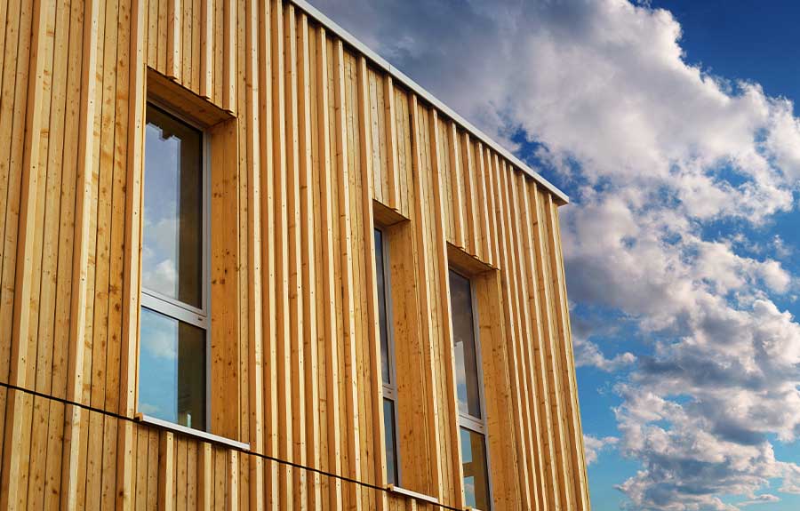 Konstruktive Hölzer Fassade • Bünder